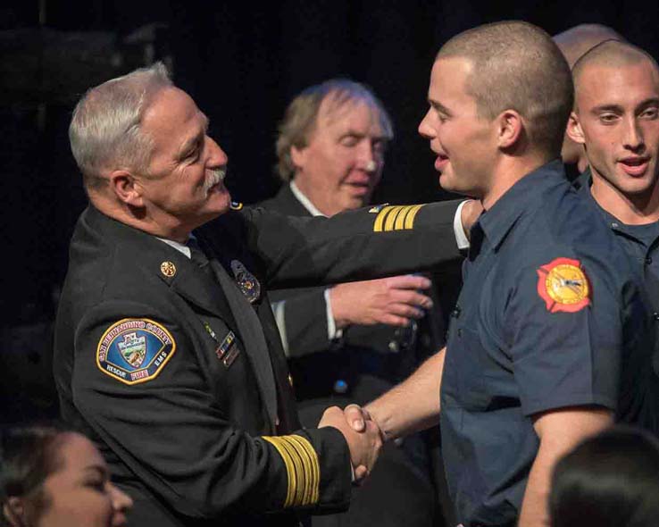 Students at Fire Academy graduation