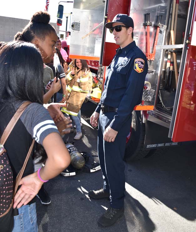 Ambulance and people at Allied Health and Medical Careers day