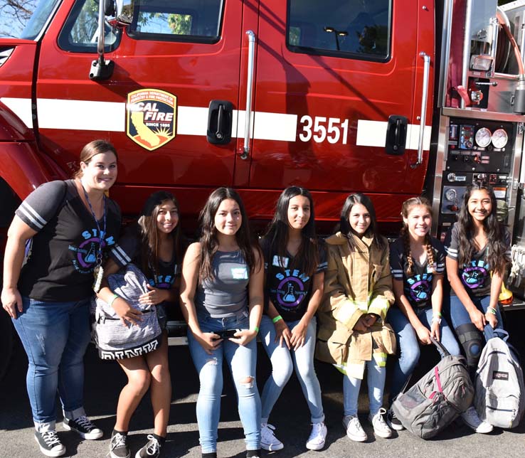 Ambulance and people at Allied Health and Medical Careers day