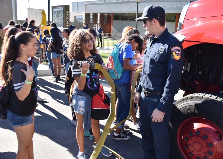 Ambulance and people at Allied Health and Medical Careers day