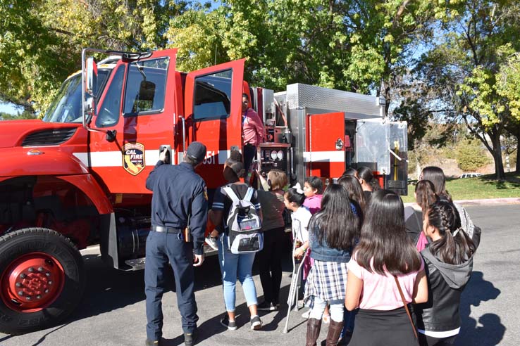 Ambulance and people at Allied Health and Medical Careers day