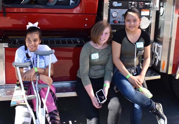 Ambulance and people at Allied Health and Medical Careers day