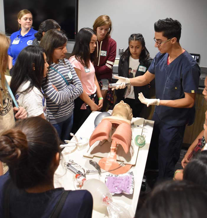 Ambulance and people at Allied Health and Medical Careers day