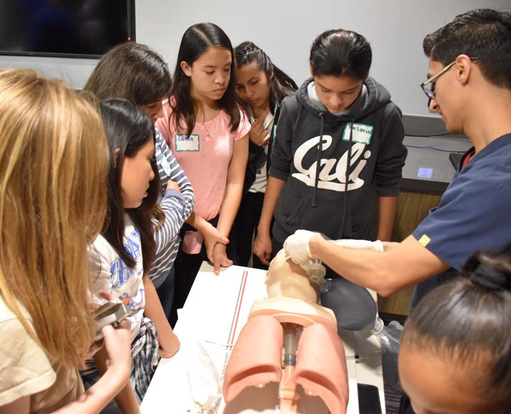 Ambulance and people at Allied Health and Medical Careers day