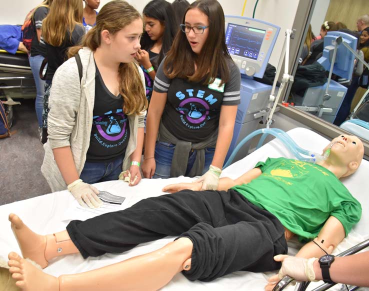 Ambulance and people at Allied Health and Medical Careers day