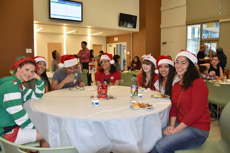 People enjoying the EOP&S Holiday Party