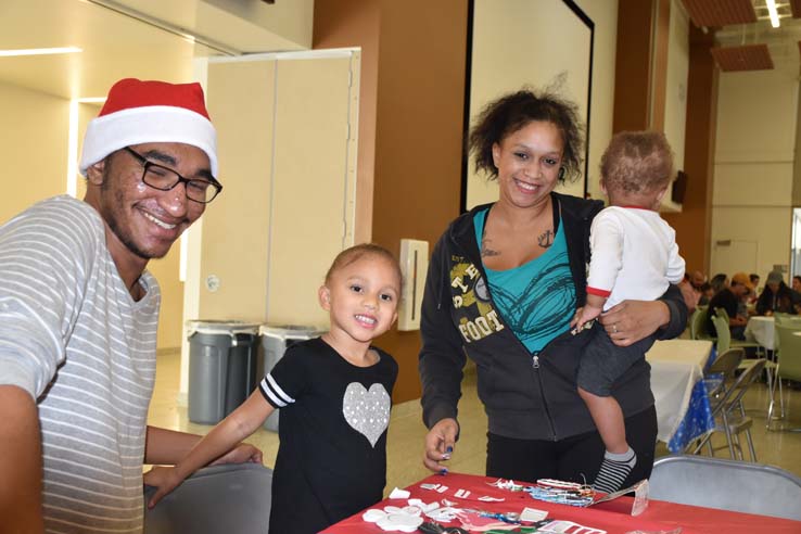 People enjoying the EOP&S Holiday Party