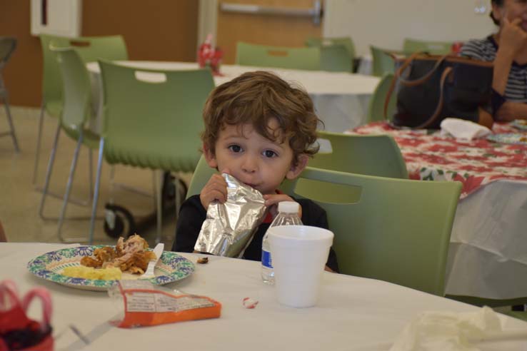 People enjoying the EOP&S Holiday Party