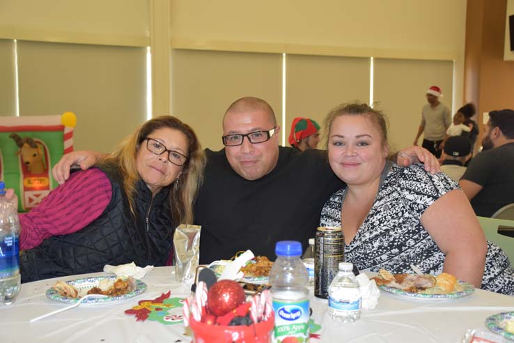 People enjoying the EOP&S Holiday Party