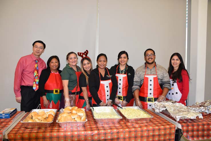 People enjoying the EOP&S Holiday Party