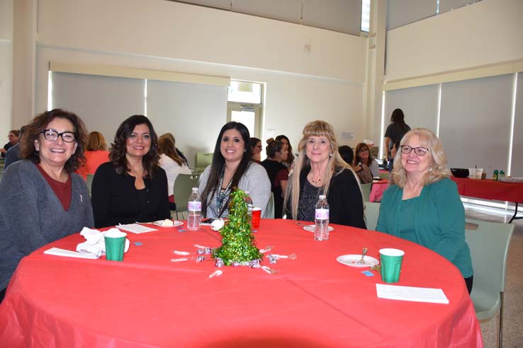 People enjoying the holiday party