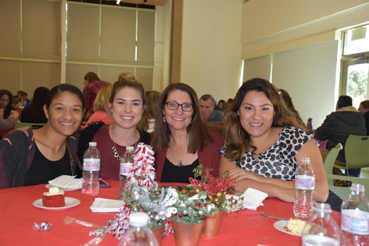 People enjoying the holiday party