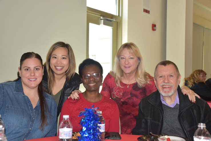 People enjoying the holiday party