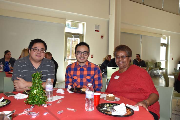 People enjoying the holiday party