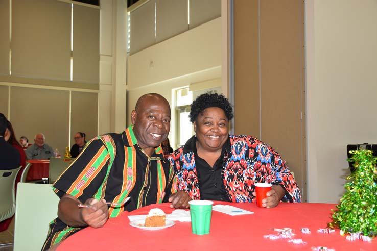 People enjoying the holiday party