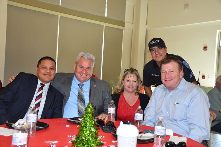 People enjoying the holiday party