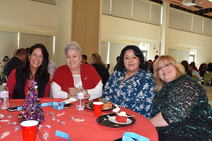 People enjoying the holiday party