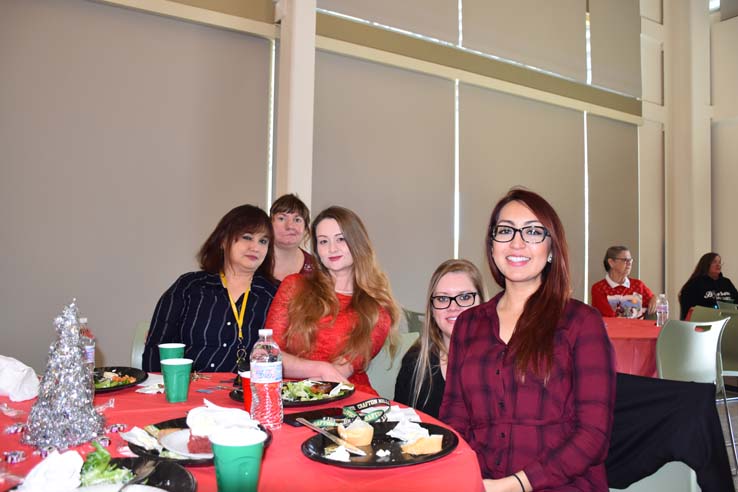 People enjoying the holiday party