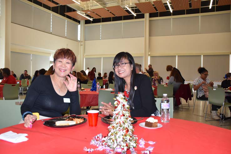 People enjoying the holiday party