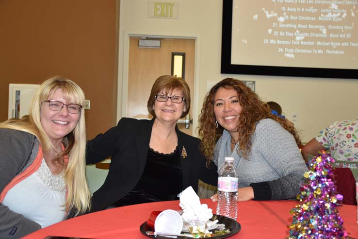 People enjoying the holiday party