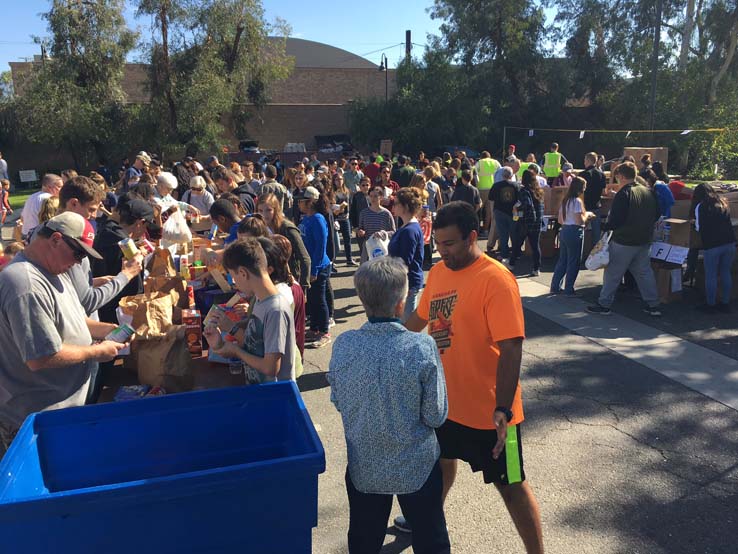 People enjoying the Three Peaks Challenge food sorting event