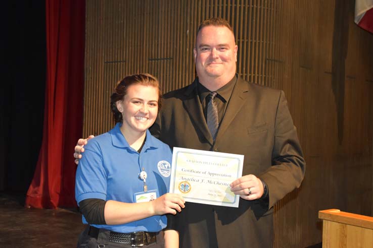 Faculty and students at EMT graduation