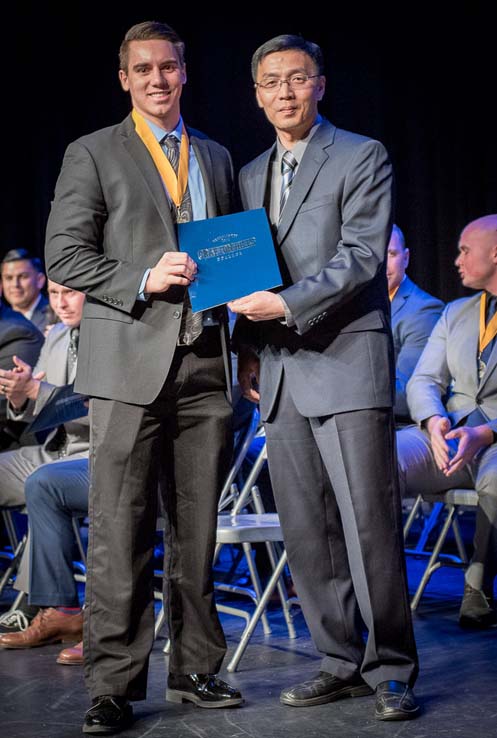 Students and faculty at Paramedic graduation