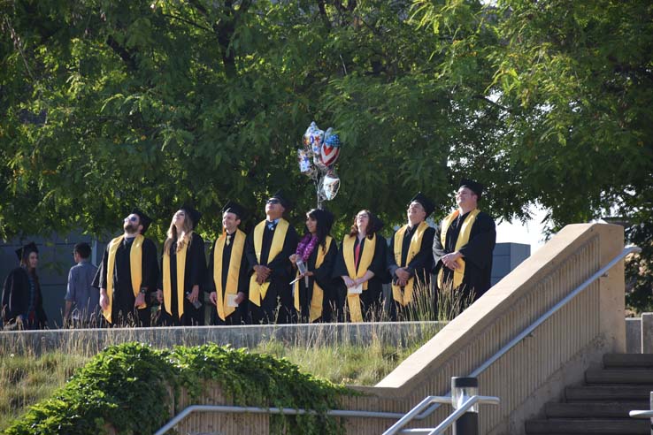 People enjoying commencement activities