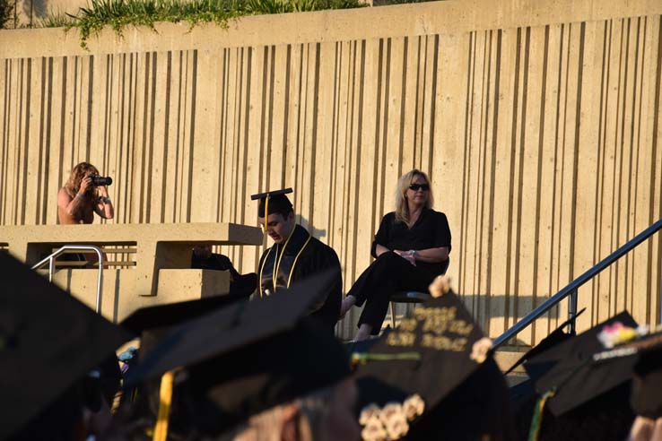 People enjoying commencement activities