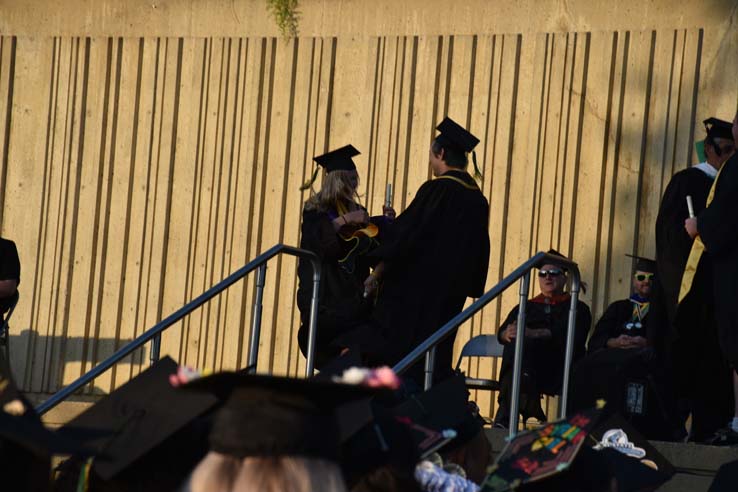 People enjoying commencement activities