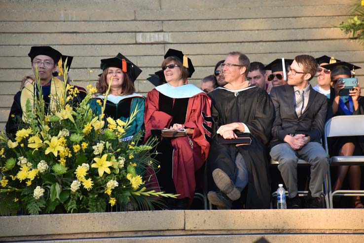 People enjoying commencement activities