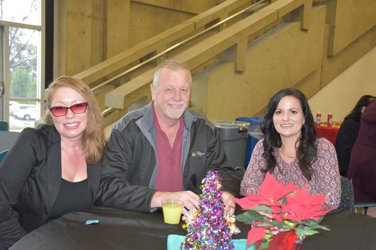 People enjoying the Holiday Party