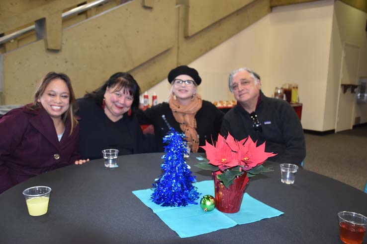 People enjoying the Holiday Party