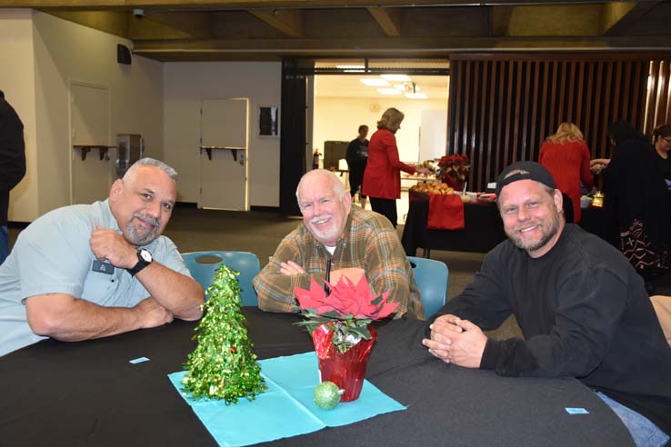 People enjoying the Holiday Party