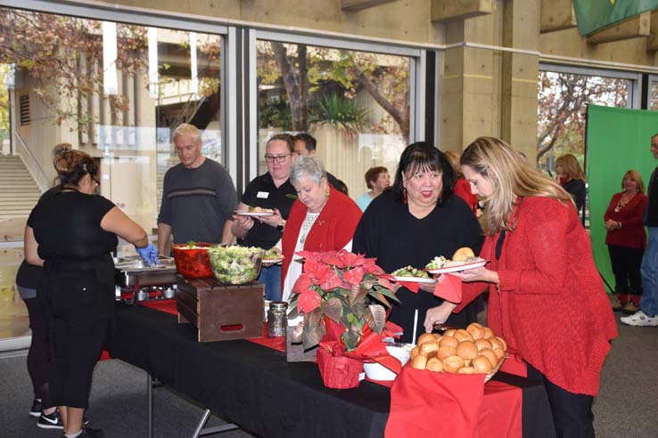 People enjoying the Holiday Party