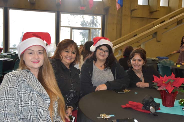 People enjoying the Holiday Party