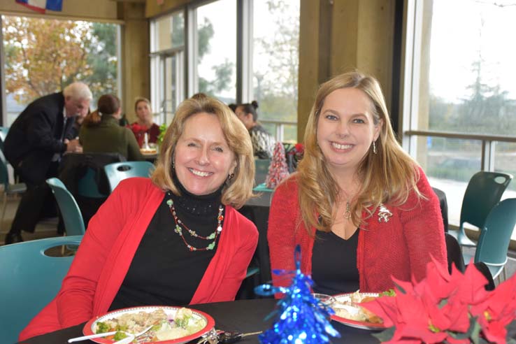 People enjoying the Holiday Party