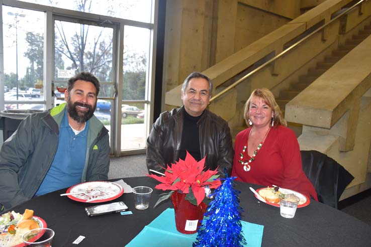 People enjoying the Holiday Party