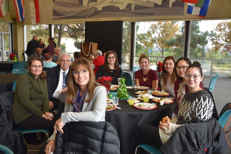 People enjoying the Holiday Party