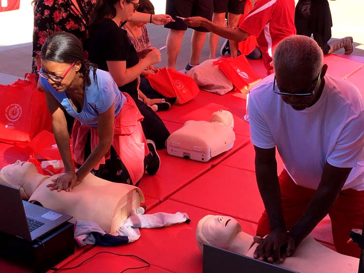 People practicing CPR