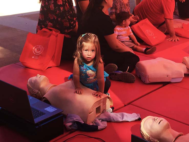 People practicing CPR