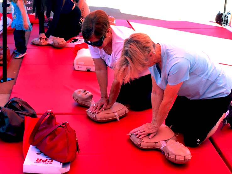 People practicing CPR