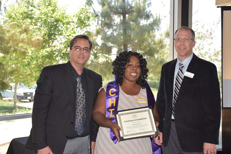 CHC Honors Institute graduates showcase their academic achievements.