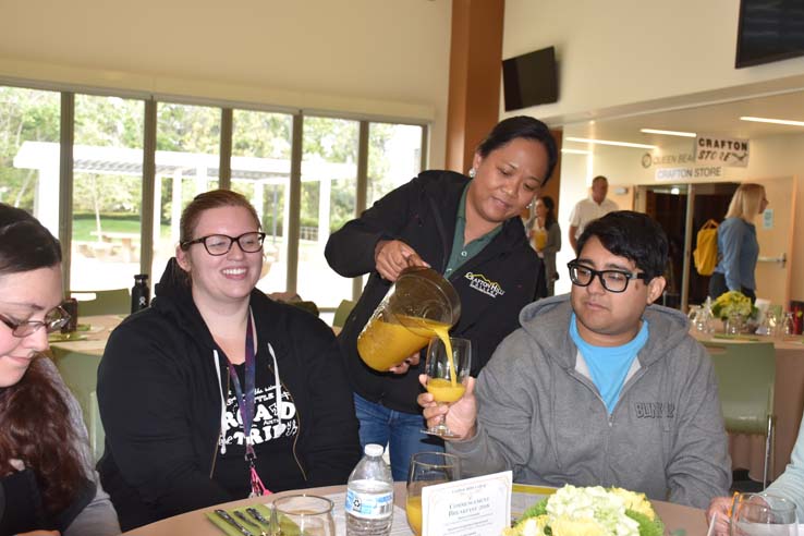 Students enjoying the Grad Breakfast