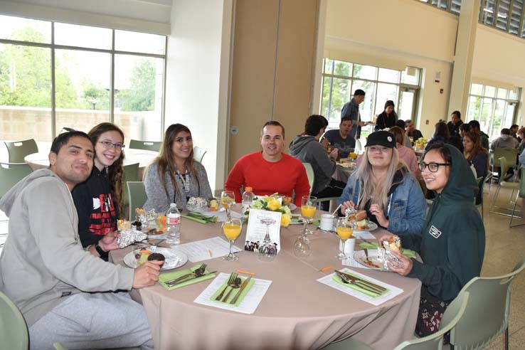 Students enjoying the Grad Breakfast