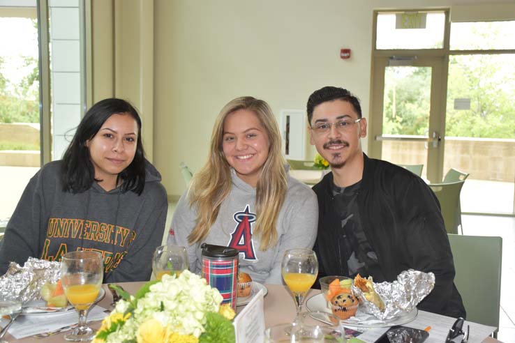 Students enjoying the Grad Breakfast