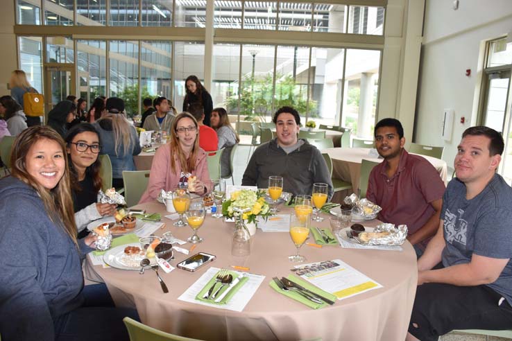 Students enjoying the Grad Breakfast