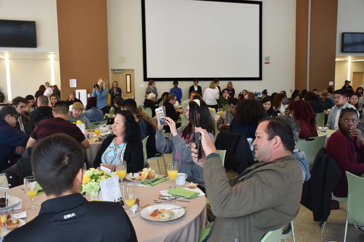 Students enjoying the Grad Breakfast