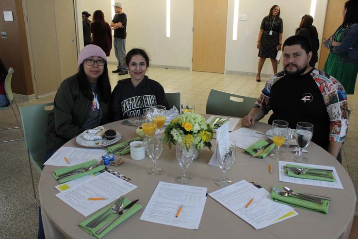 Students enjoying the Grad Breakfast