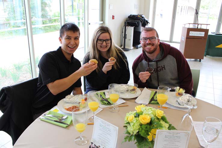 Students enjoying the Grad Breakfast